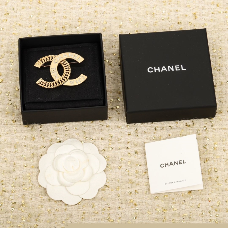 Ch*el brooches